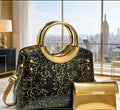 Black & Gold Floral Handbag with Circular Handles + Metallic Gold Clutch