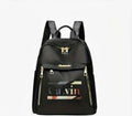 Black Designer Backpack with Gold Zippers