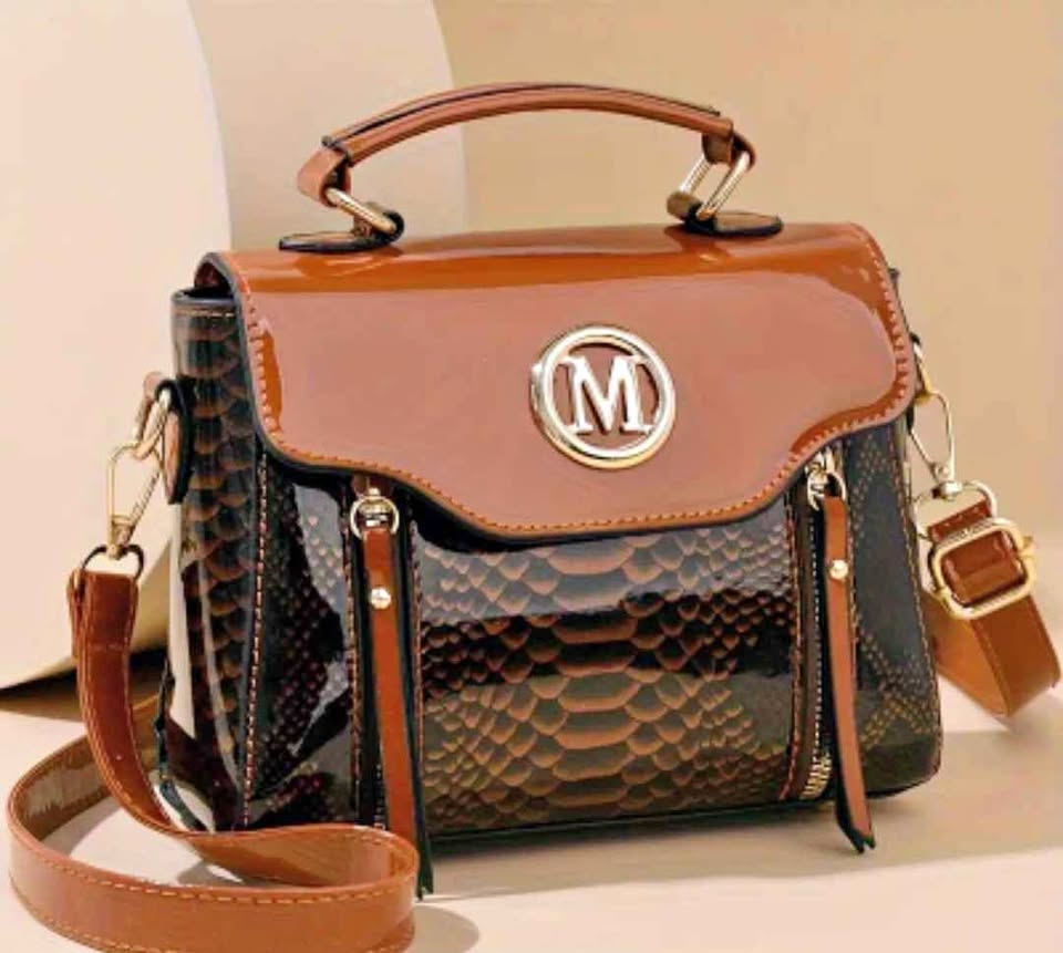 Brown Textured Handbag with Glossy Flap & Gold “M” Emblem
