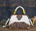 Cream & Floral Tooled‑Pattern Handbag with Gold‑Wrapped Handle