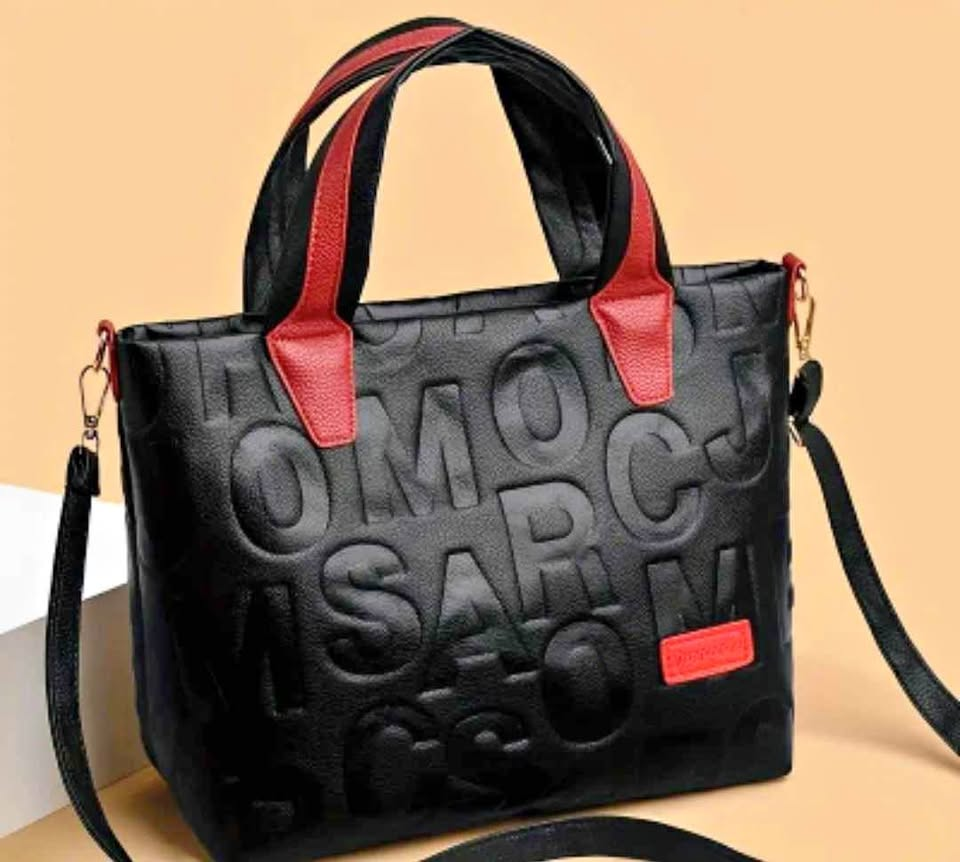 Black Embossed Letter Handbag with Red Accents & Gold Hardware